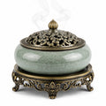 Bruciatore d'incenso Ø 18 cm in ceramica verde e metallo bronzo con coperchio traforato