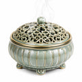 Bruciatore di incenso in ceramica diametro 16 cm verde salvia con coperchio traforato decorativo