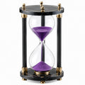 Clessidra decorativa 20 x 35 cm in vetro e metallo nero oro con sabbia viola